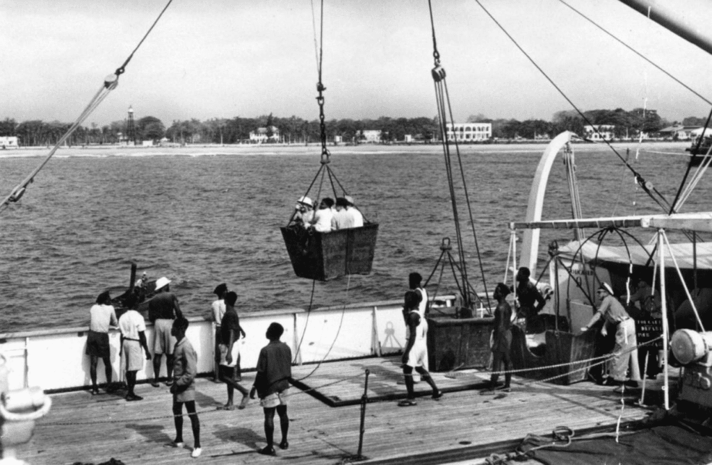 Passengers being loaded into a ship