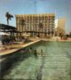 A picture advert for Hotel de la Paix, showing people inside the pool.