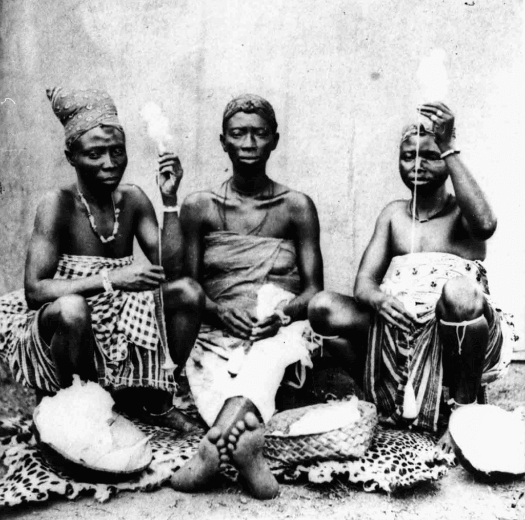 Three women spinning cotton, 1873